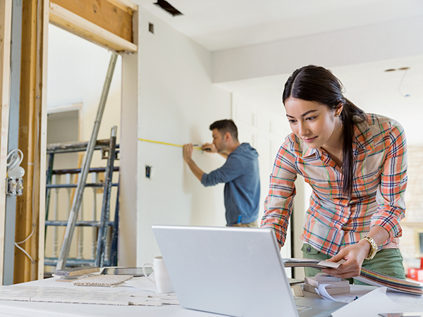 Man and woman planning do-it-yourself home improvement project
