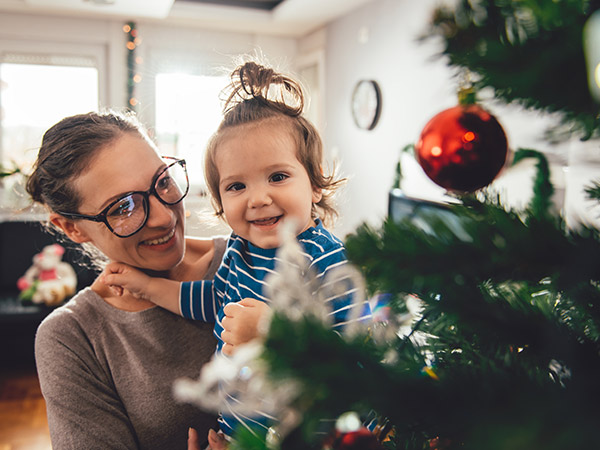 family and christmas tree